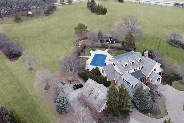 birds eye view of property with a rural view