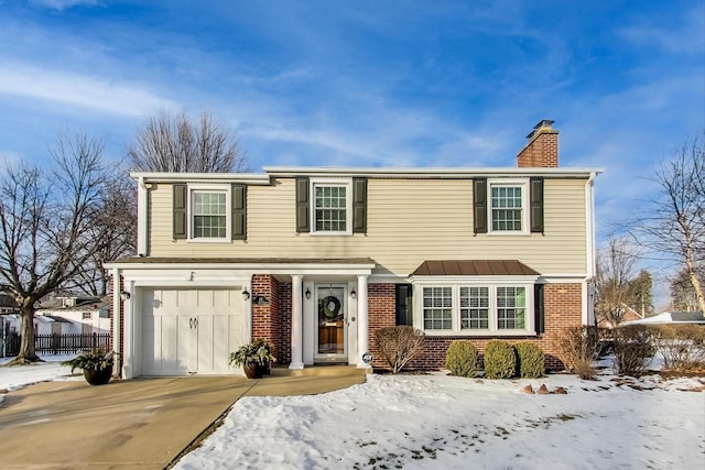 view of front of property featuring a garage