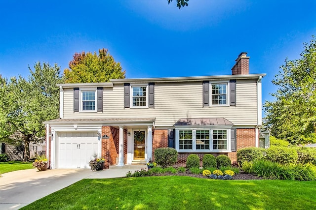 view of front facade featuring a front yard and a garage