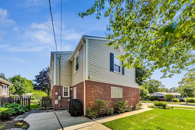 view of property exterior featuring a yard