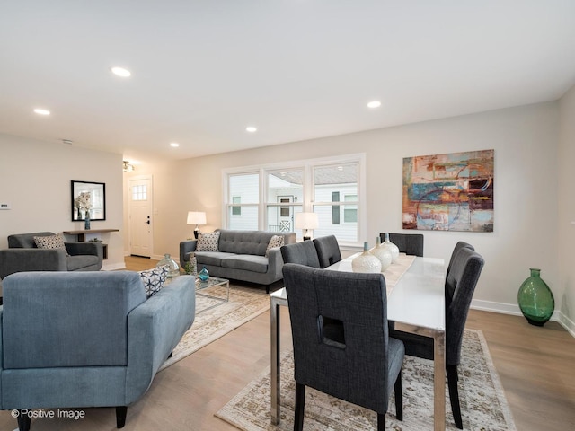 dining space featuring light hardwood / wood-style flooring