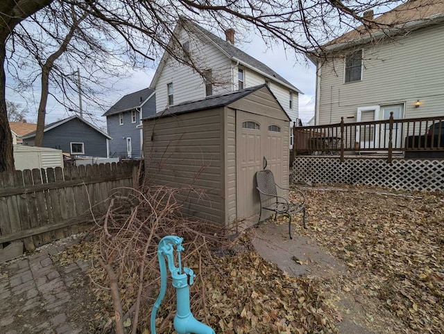 exterior space featuring a shed and a deck