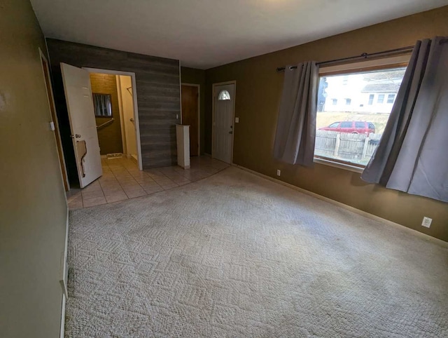 unfurnished bedroom with light carpet