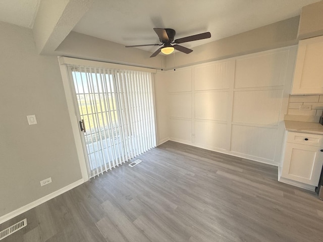 interior space with hardwood / wood-style flooring and ceiling fan