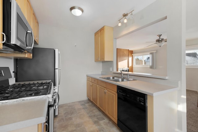 kitchen featuring sink, stainless steel appliances, ceiling fan, and light brown cabinets