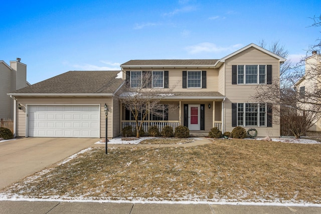 traditional home with roof with shingles, a yard, a porch, concrete driveway, and a garage