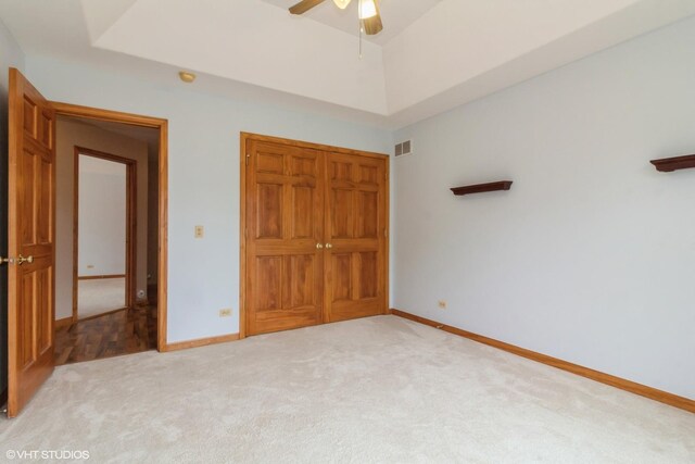 bathroom with tile patterned floors, vanity, toilet, and an enclosed shower