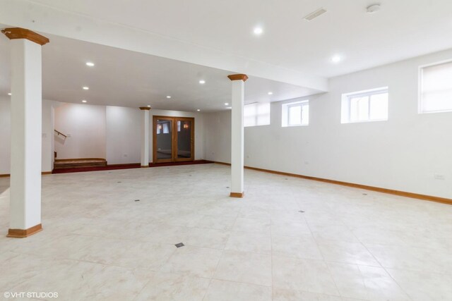 walk in closet featuring light colored carpet