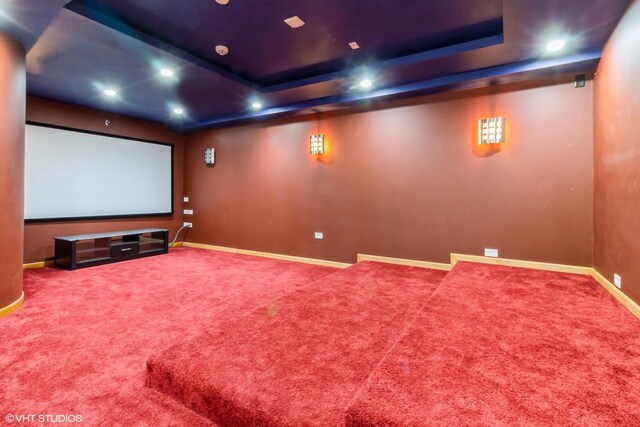 empty room featuring carpet flooring, ceiling fan, and lofted ceiling