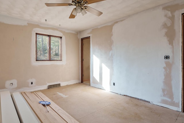 spare room featuring ceiling fan