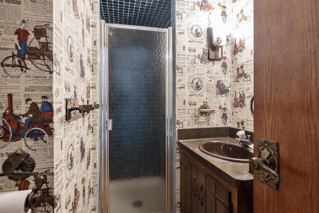 bathroom with vanity and an enclosed shower