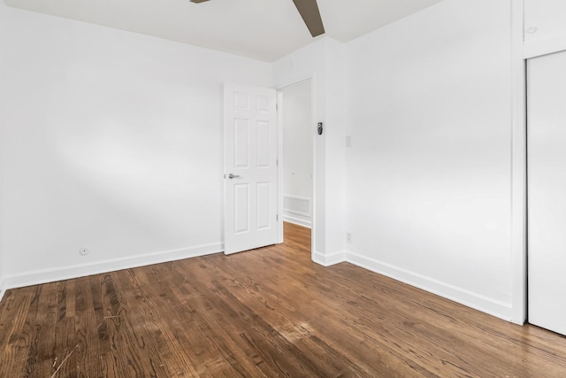 unfurnished room featuring wood-type flooring