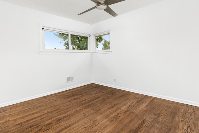 spare room featuring ceiling fan and wood-type flooring