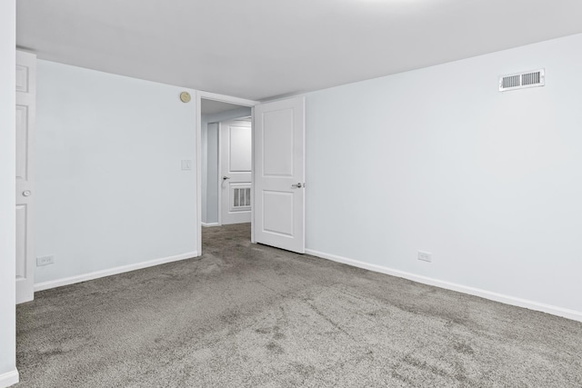 unfurnished room with carpet