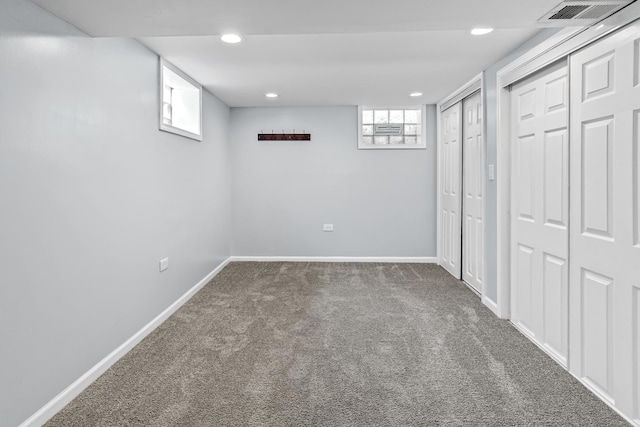 basement with carpet flooring