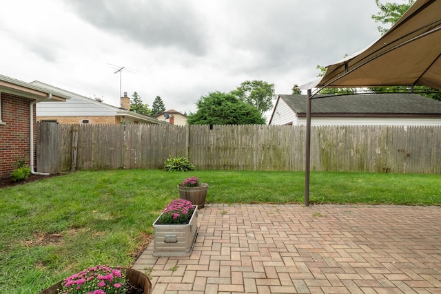 view of yard with a patio area