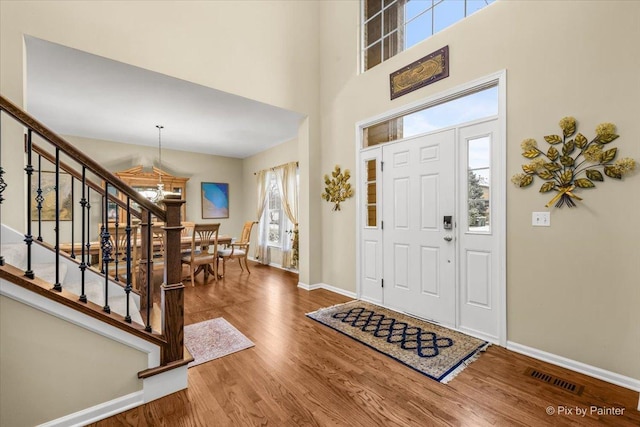 entrance foyer featuring hardwood / wood-style floors