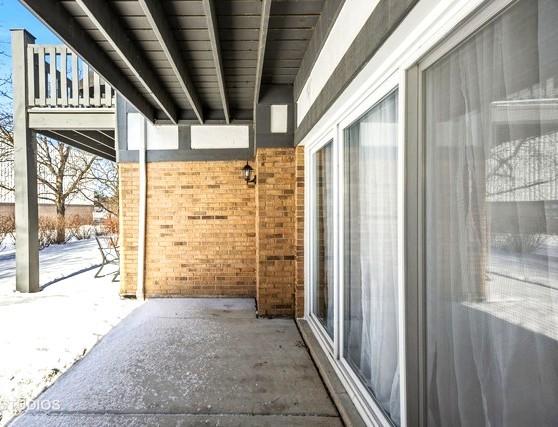 view of snow covered patio