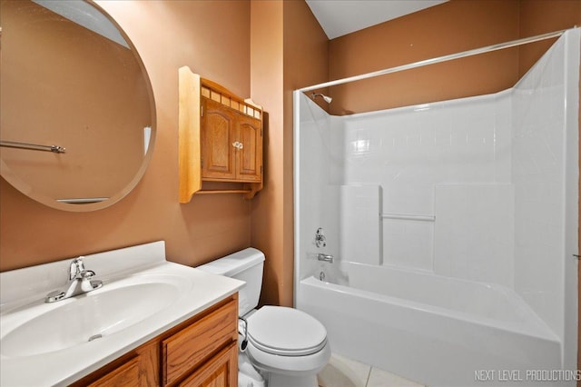 full bathroom with shower / tub combination, tile patterned floors, vanity, and toilet