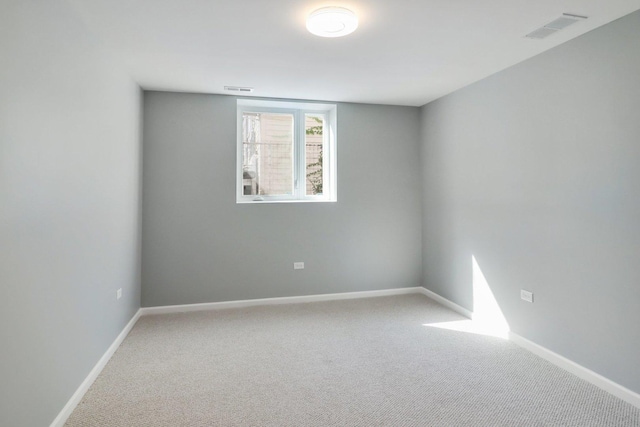 unfurnished room with carpet floors