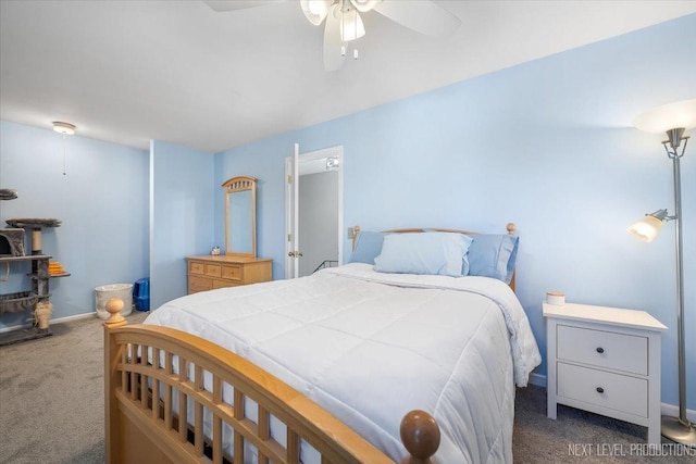 bedroom with dark carpet and ceiling fan