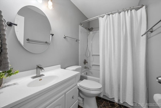 full bathroom featuring toilet, shower / bath combo, and vanity