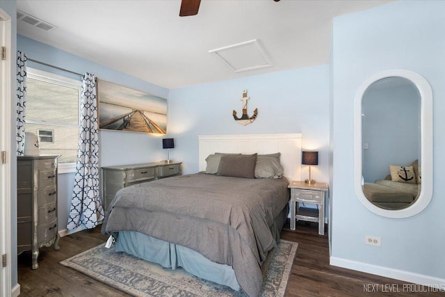 bedroom with ceiling fan and dark hardwood / wood-style floors