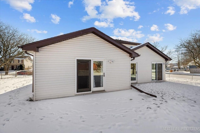 view of snow covered property