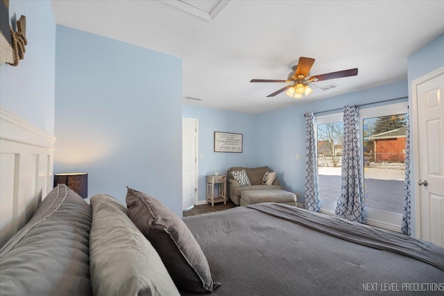 bedroom with ceiling fan and access to outside