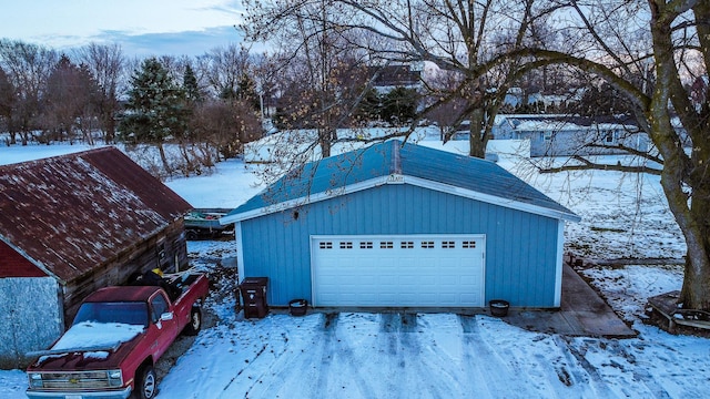 view of snow covered garage