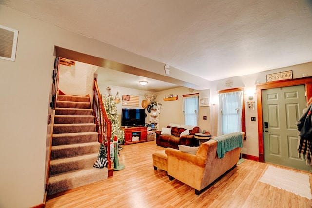 living room with hardwood / wood-style floors