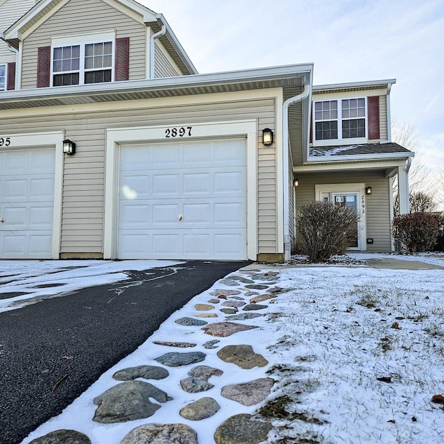 view of front of property featuring a garage