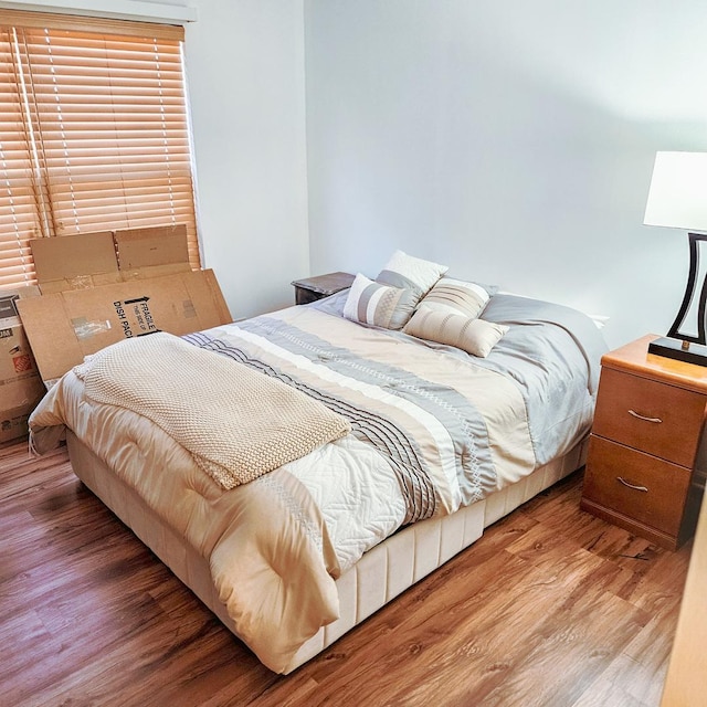 bedroom with wood-type flooring