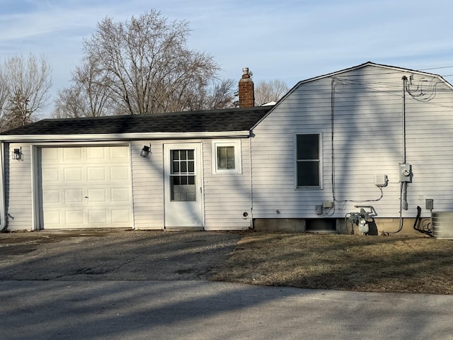 garage featuring central AC unit