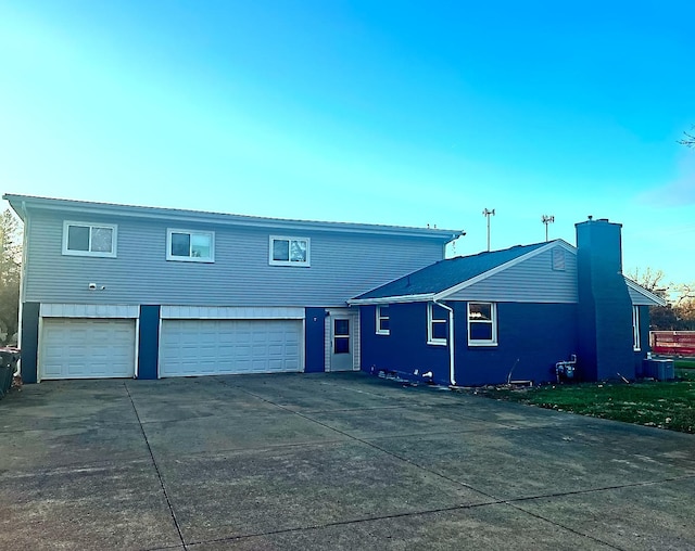 view of front of home with a garage