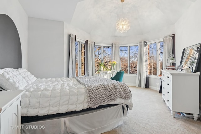 bedroom with light colored carpet, vaulted ceiling, baseboards, and an inviting chandelier