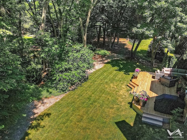 view of yard featuring a wooden deck