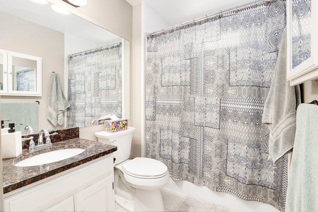 bathroom with vanity, tile patterned flooring, toilet, and a shower with shower curtain