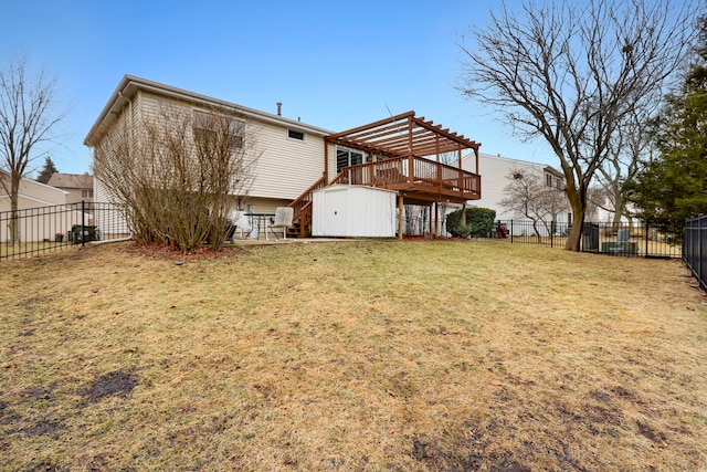 back of house with a lawn, a deck, a shed, and a pergola