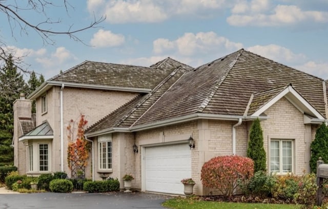 view of front of home with a garage