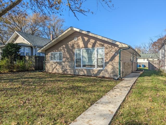 view of property exterior featuring a yard