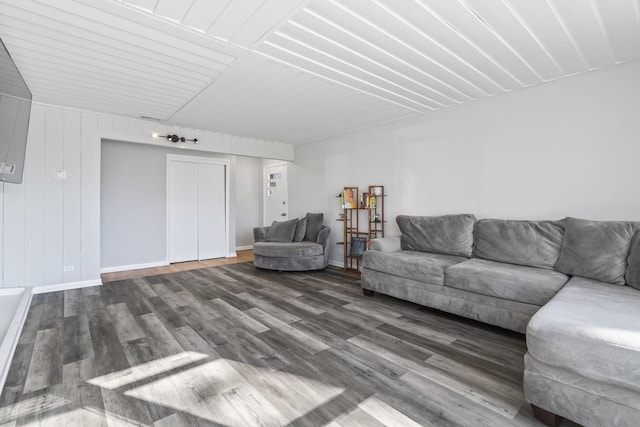 living room featuring dark wood-type flooring