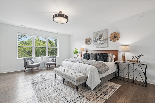 bedroom with wood-type flooring