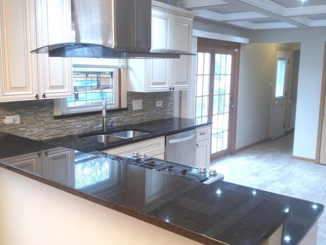 kitchen with dishwasher, coffered ceiling, sink, range hood, and white cabinetry