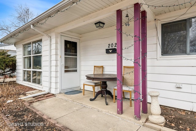 property entrance featuring a patio