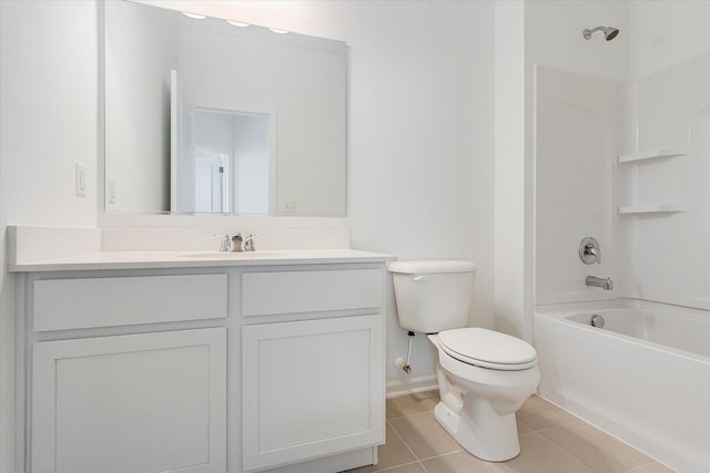 bathroom featuring  shower combination, vanity, tile patterned flooring, and toilet