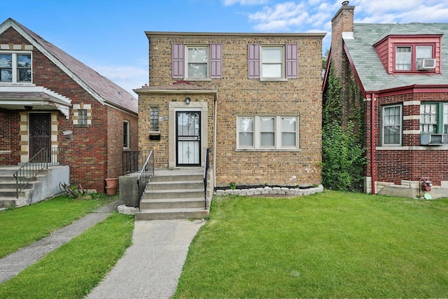 view of front of property with a front lawn