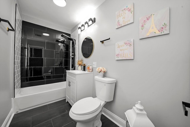 full bathroom featuring vanity, tiled shower / bath combo, and toilet