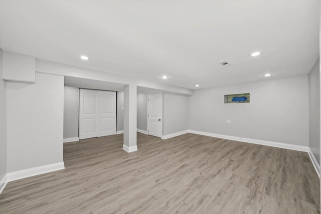 basement with wood-type flooring