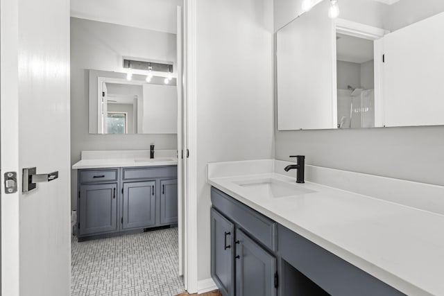 bathroom with vanity and walk in shower